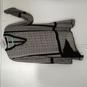 Black and white color block v-neck blouse.